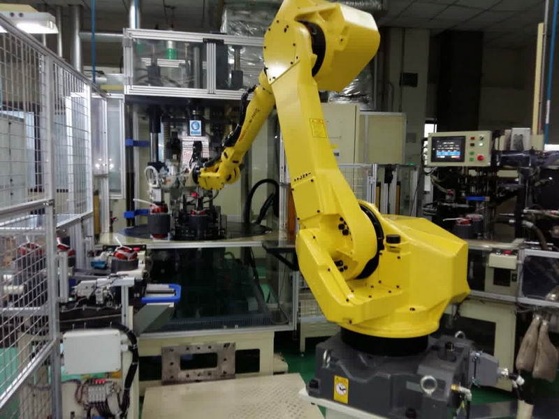 机器人五工位搬运投料专机（用于马达定子、省4人）.jpg